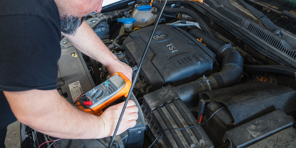 Image Of Mechanic Fixing A Car